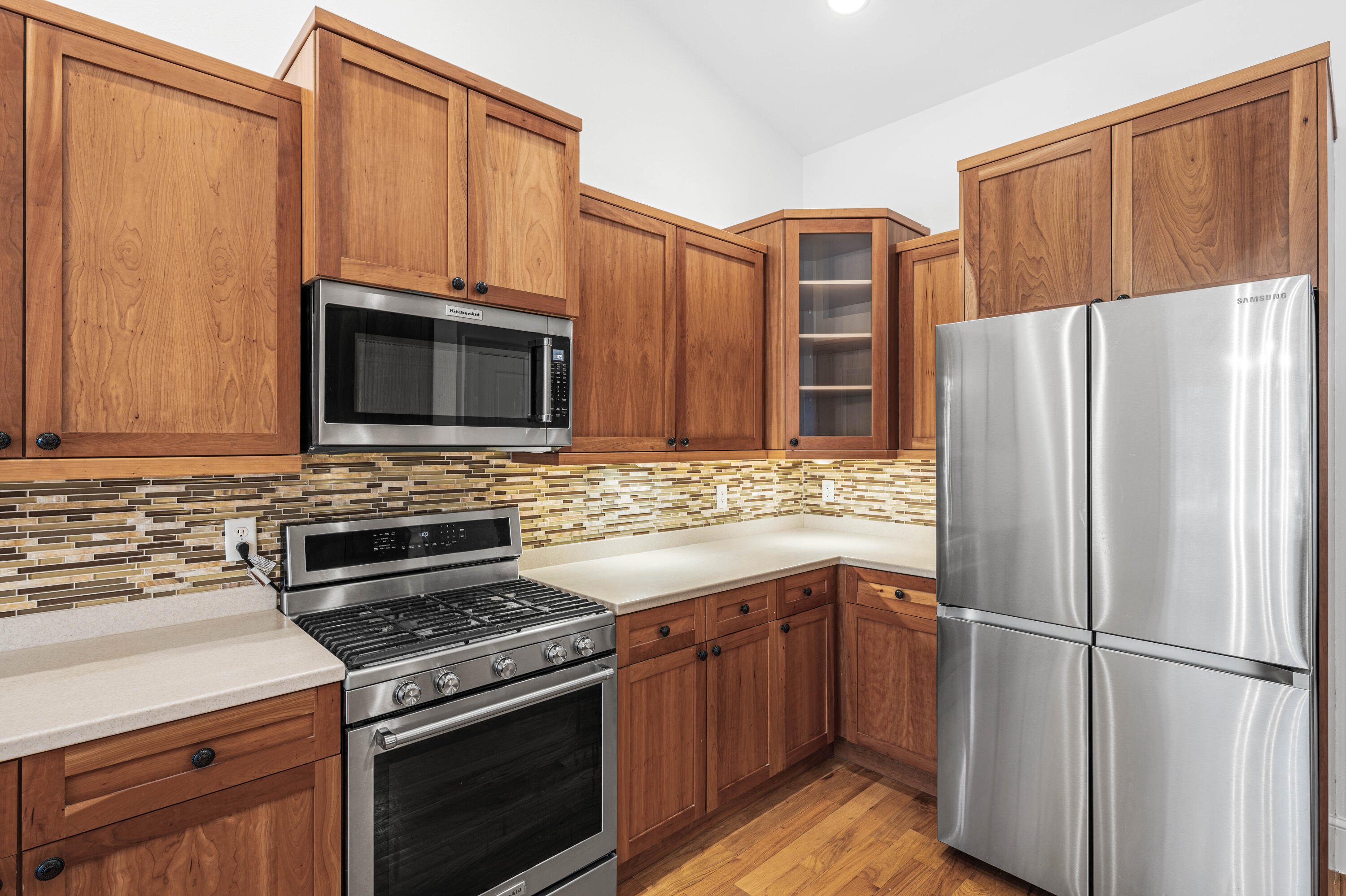 611 Amelia Lane Santa Rosa Beach, FL 32459 - Photo 21 of 59 a kitchen with stainless steel appliances a refrigerator stove and microwave