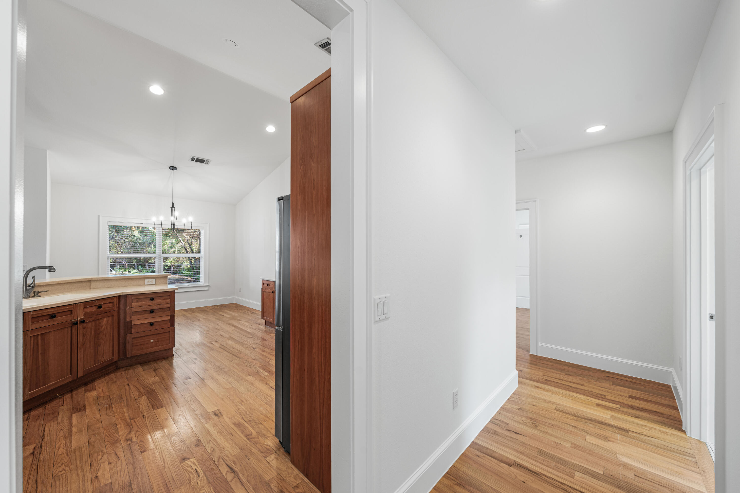 611 Amelia Lane Santa Rosa Beach, FL 32459 - Photo 24 of 59 a view of a kitchen from the hallway