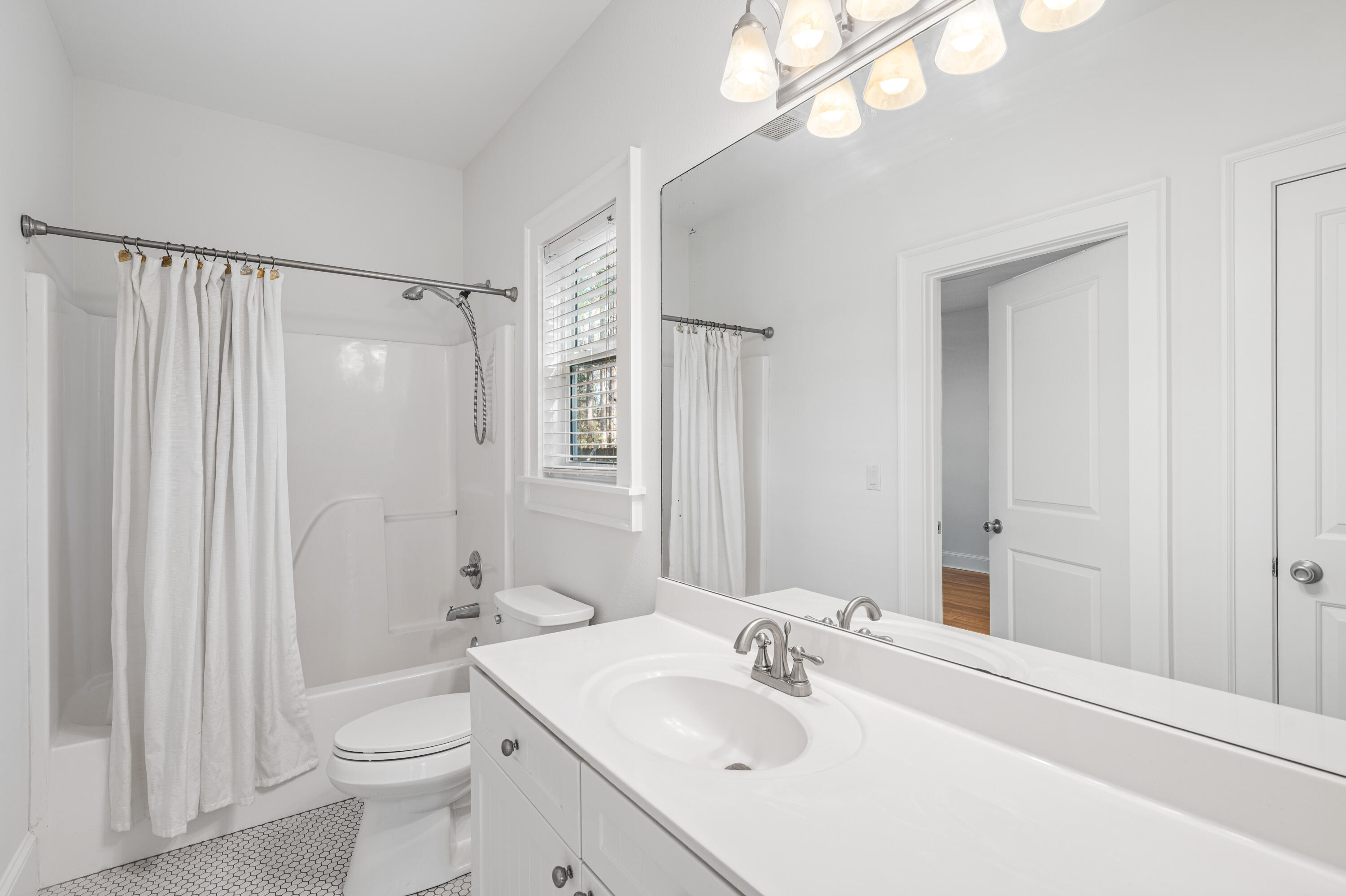 611 Amelia Lane Santa Rosa Beach, FL 32459 - Photo 30 of 59 a bathroom with a sink toilet and shower