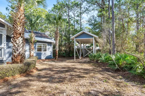 a view of a trees in front of a house