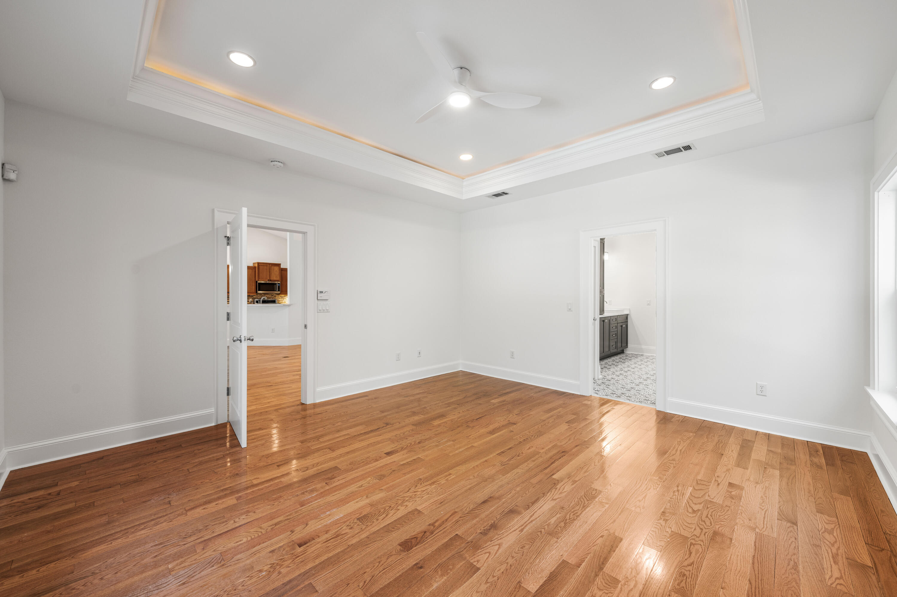 611 Amelia Lane Santa Rosa Beach, FL 32459 - Photo 34 of 59 a view of empty room with wooden floor