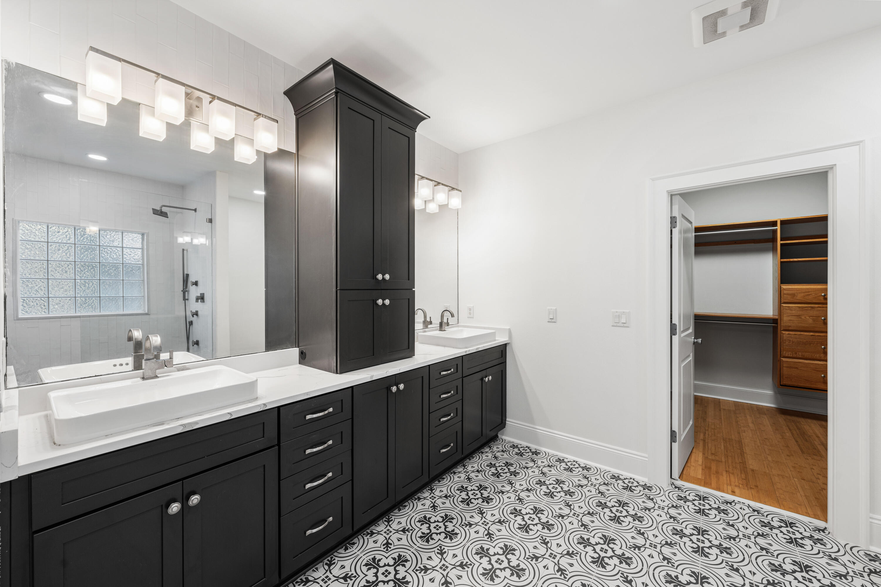 611 Amelia Lane Santa Rosa Beach, FL 32459 - Photo 37 of 59 a bathroom with a double vanity sink and mirror