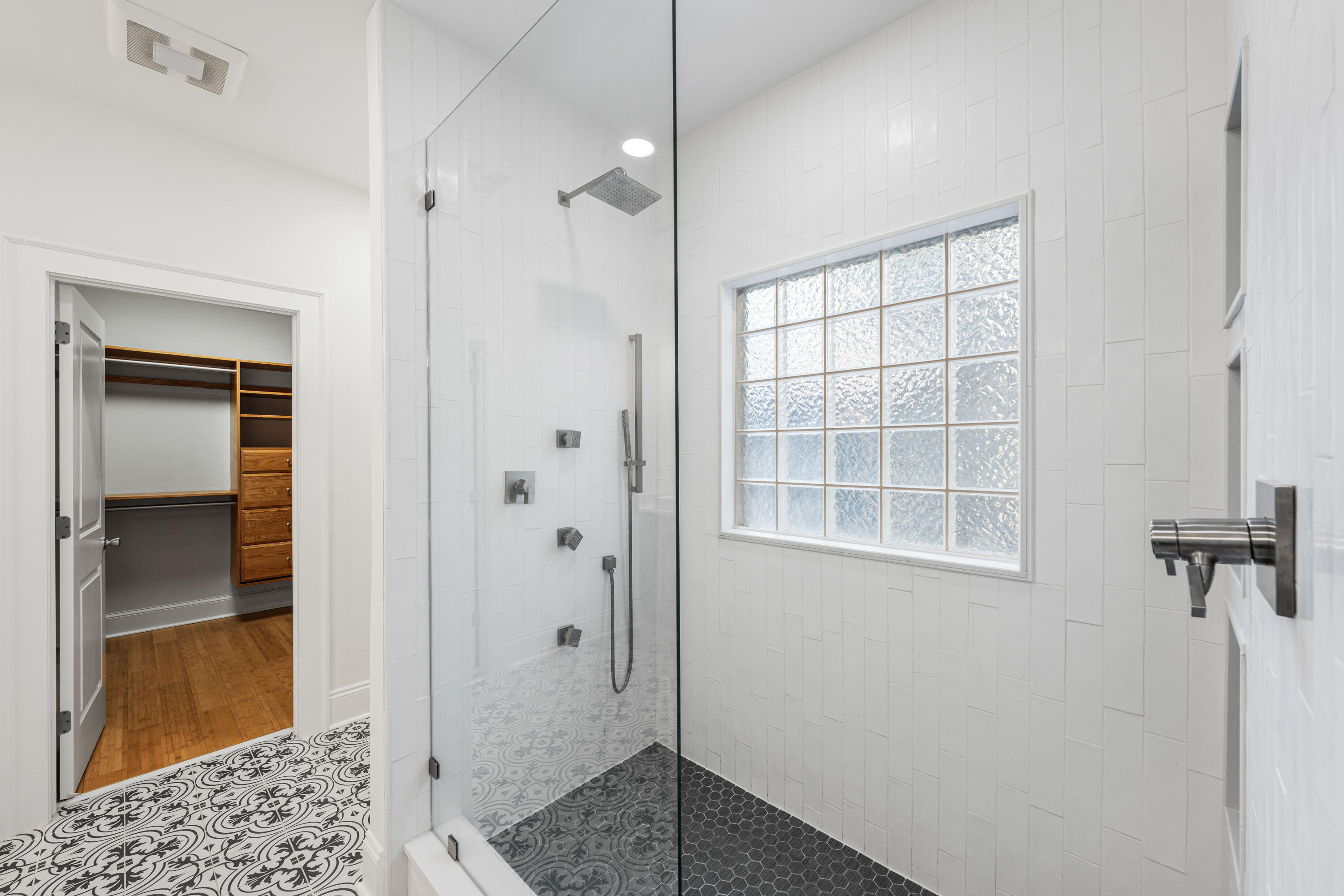 611 Amelia Lane Santa Rosa Beach, FL 32459 - Photo 40 of 59 a view of a bathroom with a shower and a sink