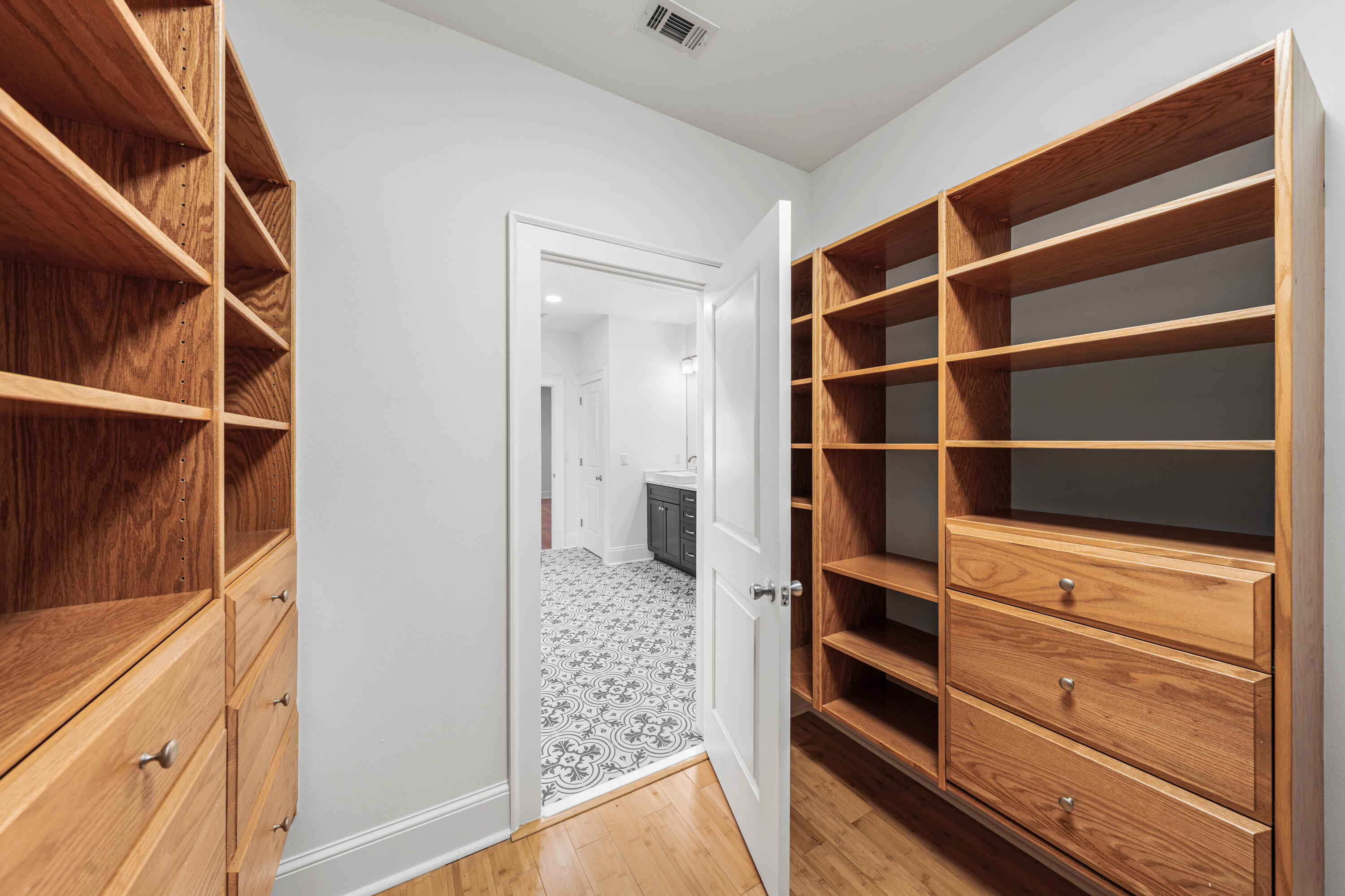611 Amelia Lane Santa Rosa Beach, FL 32459 - Photo 42 of 59 a view of walk in closet with empty racks