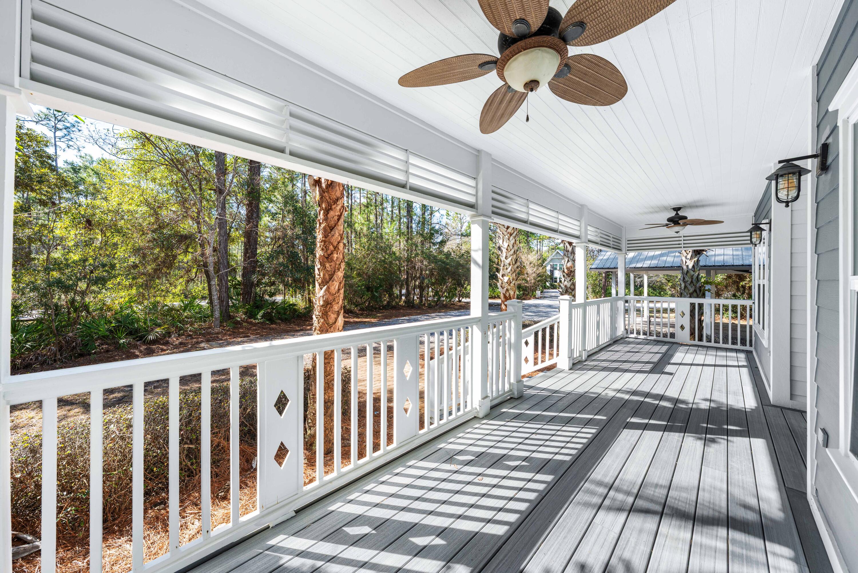 611 Amelia Lane Santa Rosa Beach, FL 32459 - Photo 6 of 59 a view of a balcony with wooden floor