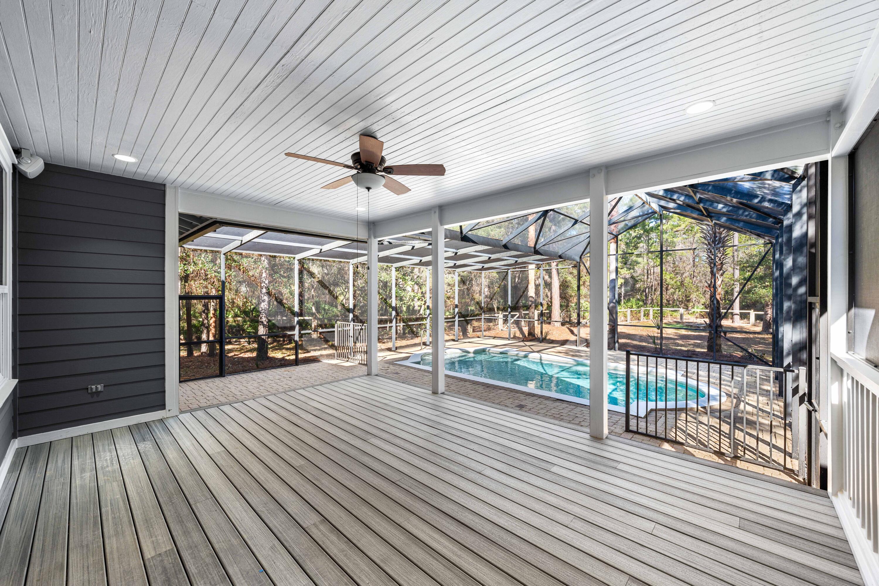 611 Amelia Lane Santa Rosa Beach, FL 32459 - Photo 7 of 59 a view of a livingroom with wooden floor