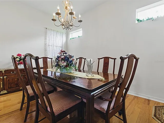 a kitchen with stainless steel appliances a refrigerator sink and cabinets