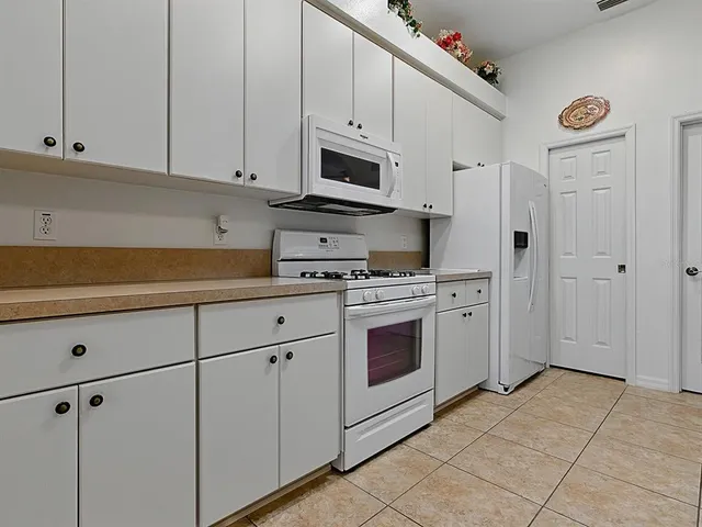 a bathroom with a tub and a shower