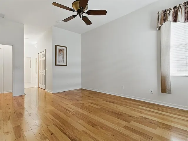 a aerial view of a house with a yard