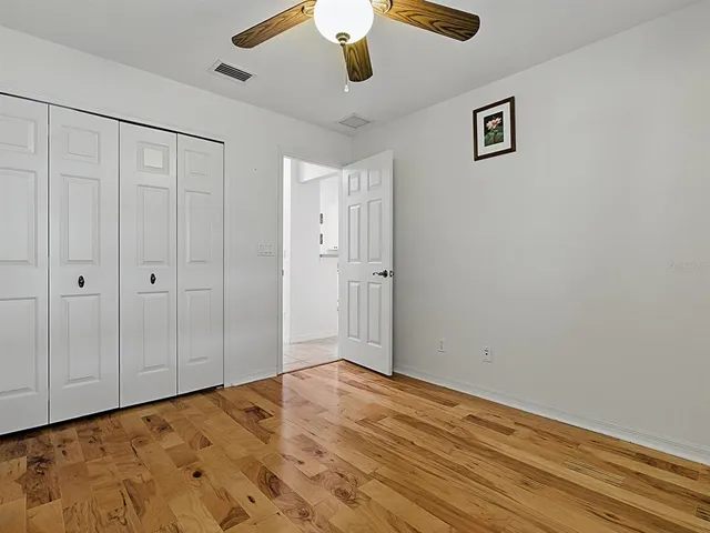 a view of a swimming pool with a yard