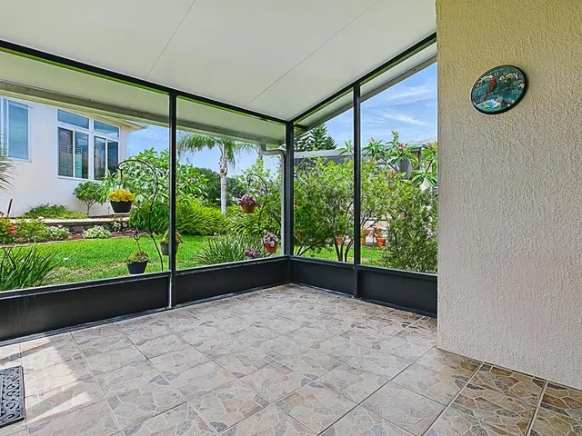 a view of a park with large trees