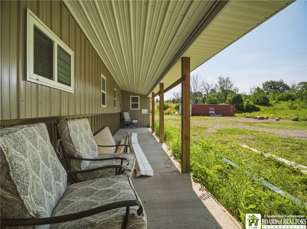 1546 Swede Road Harmony, NY 14710 - Photo 18 of 49 Back porch of the main shop