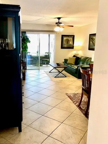 a view of a living room and dining room