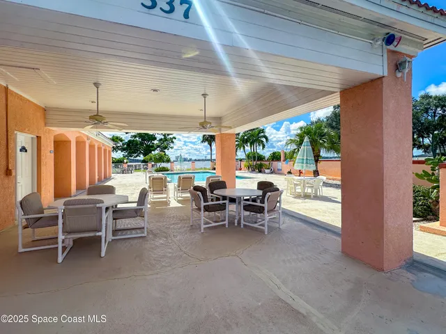 a view of a house with a swimming pool