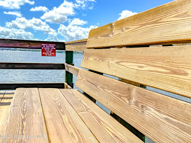 a view of a lake with a building in the background