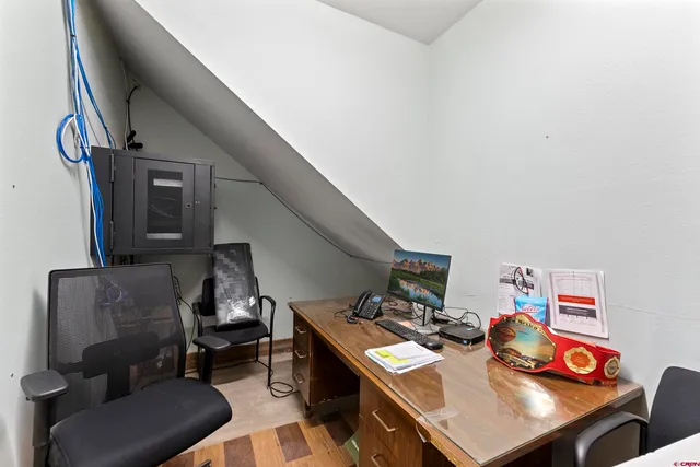 a view of a hallway with workspace