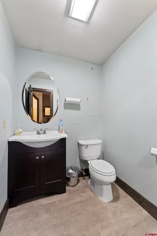 a view of livingroom with furniture and floor to ceiling window