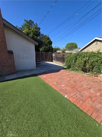 a view of a backyard with a garden