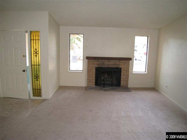 1598 Keystone Avenue Reno, NV 89503 - Photo 3 of 5 an empty room with windows