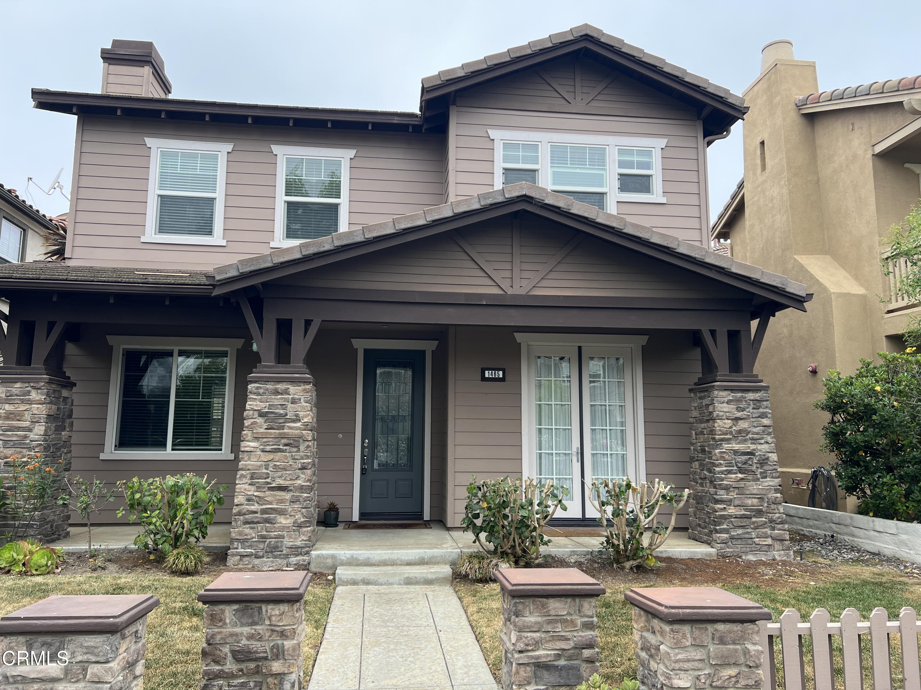 1465 Donegal Way Oxnard, CA 93035 - Photo 1 of 20 a front view of a house with garden