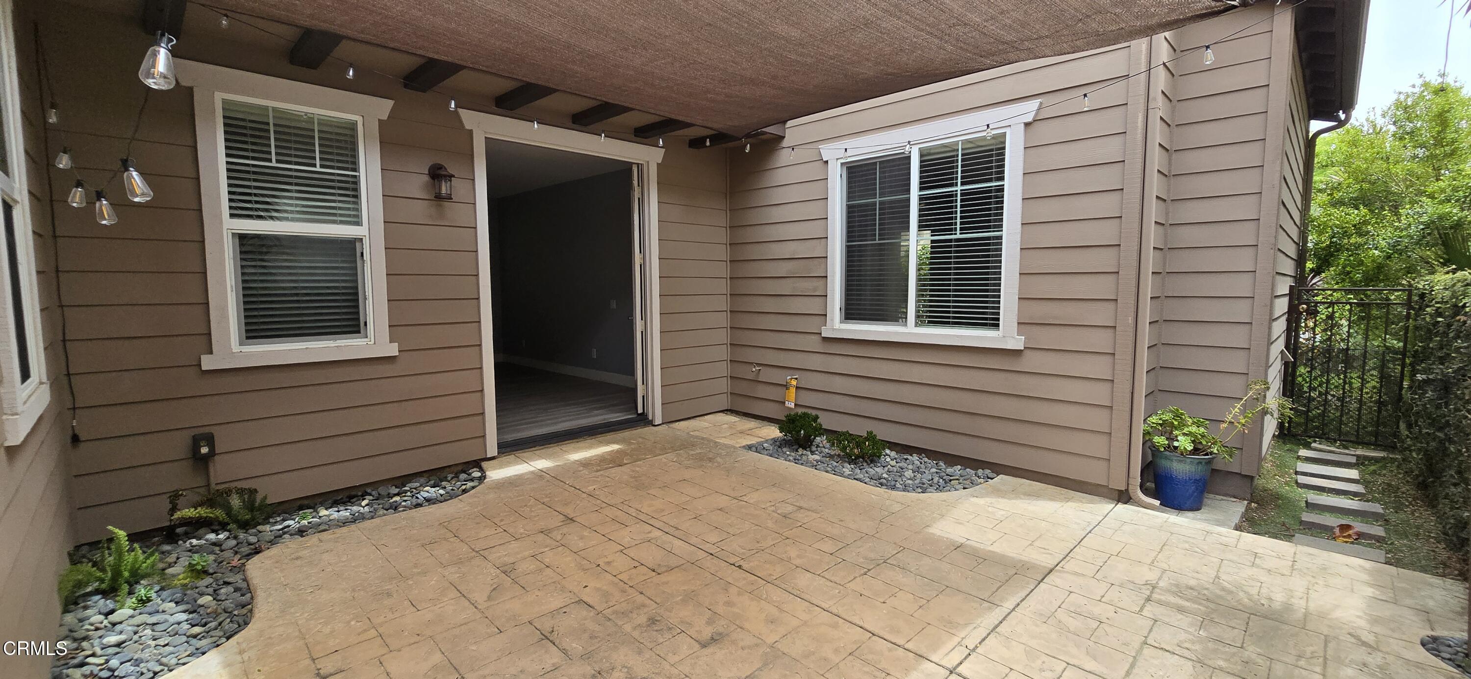 1465 Donegal Way Oxnard, CA 93035 - Photo 11 of 20 a front view of a house with a yard