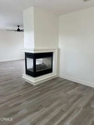 a living room with wooden floor