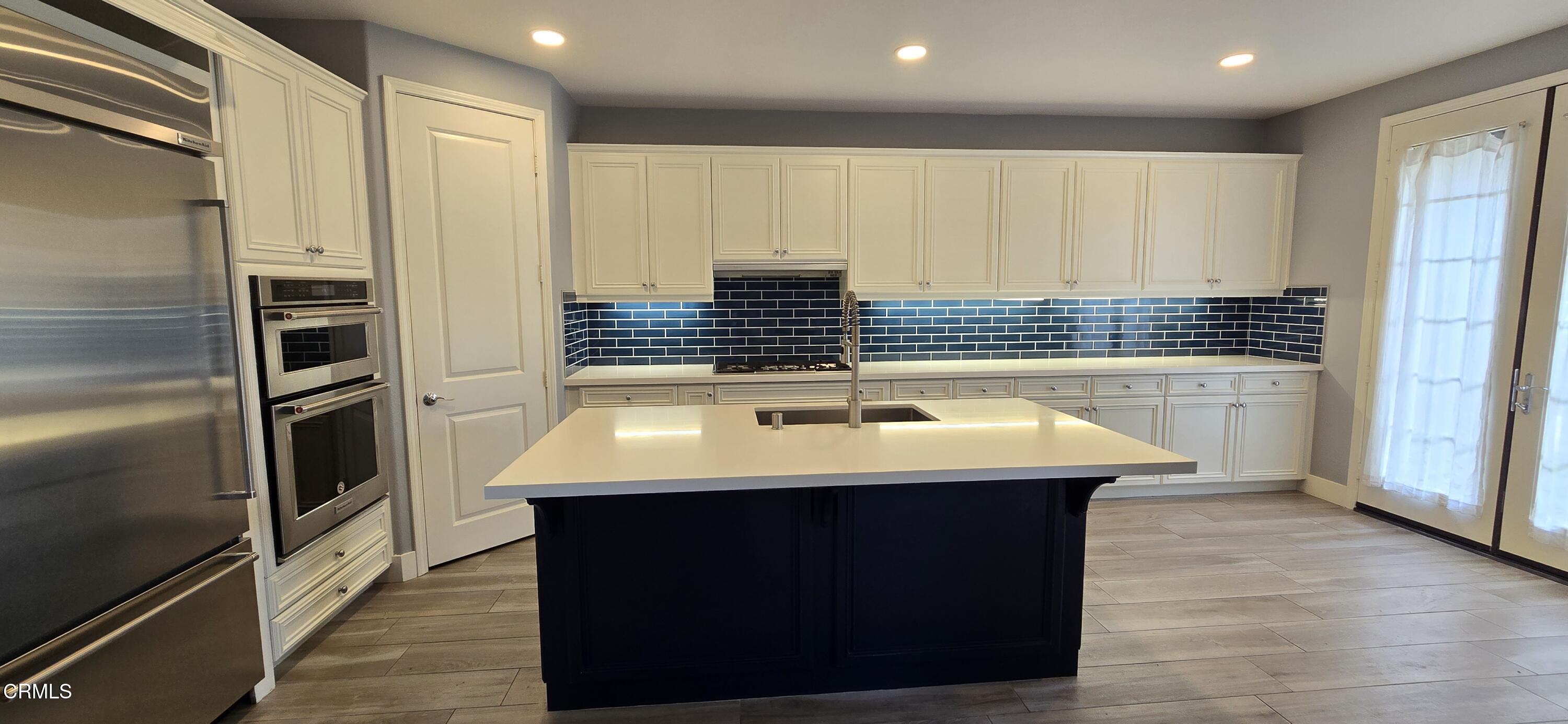 1465 Donegal Way Oxnard, CA 93035 - Photo 4 of 20 a bathroom with a sink a toilet and a shower
