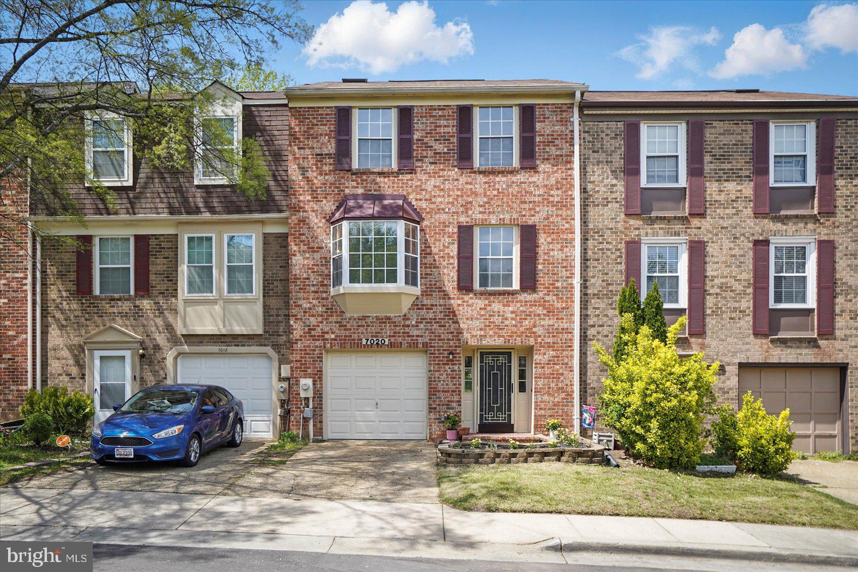 7020 Storch Lane Lanham, MD 20706 - Photo 2 of 44 a front view of a house with yard