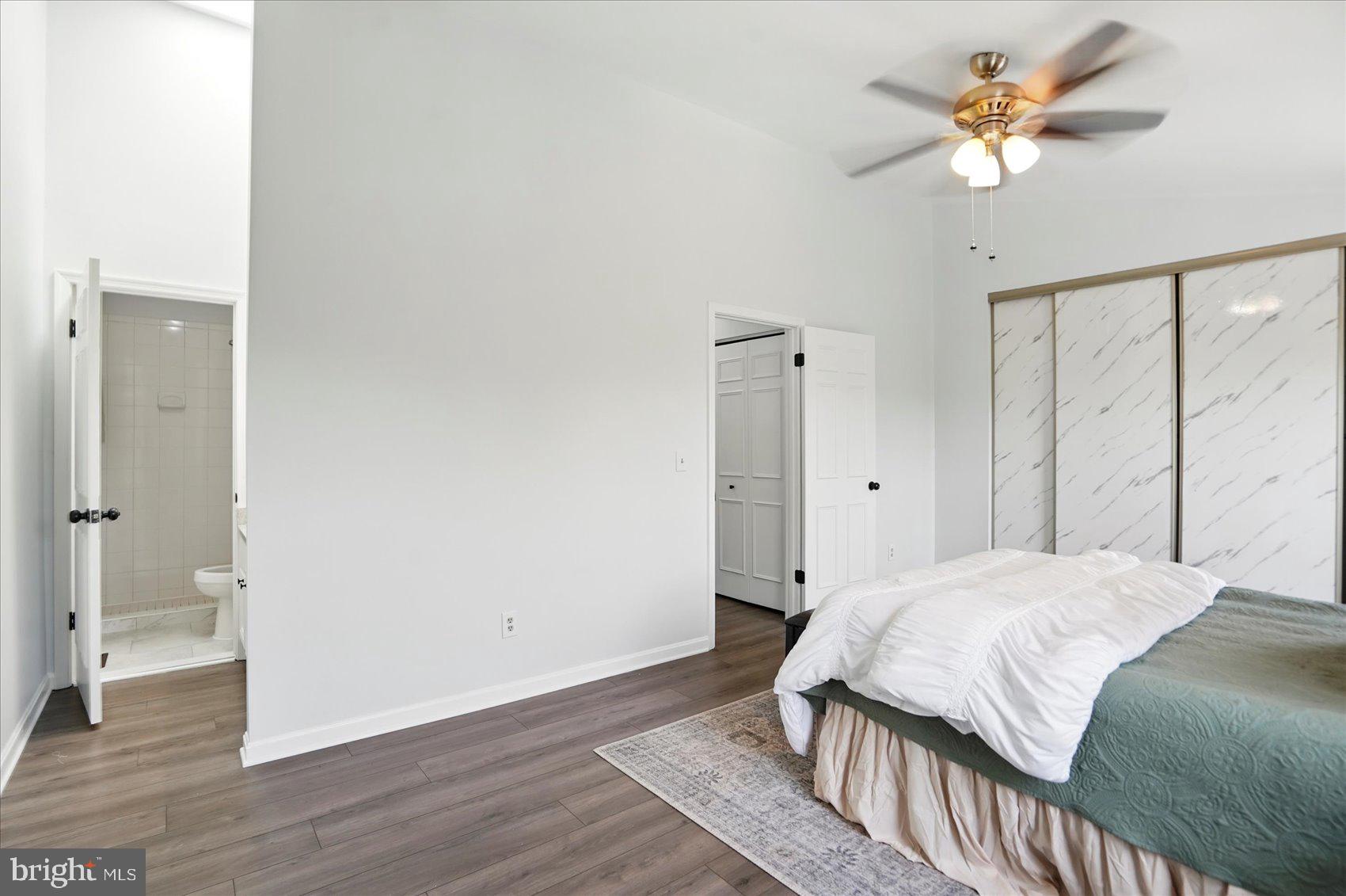 7020 Storch Lane Lanham, MD 20706 - Photo 29 of 44 a bedroom with a bed and a ceiling fan