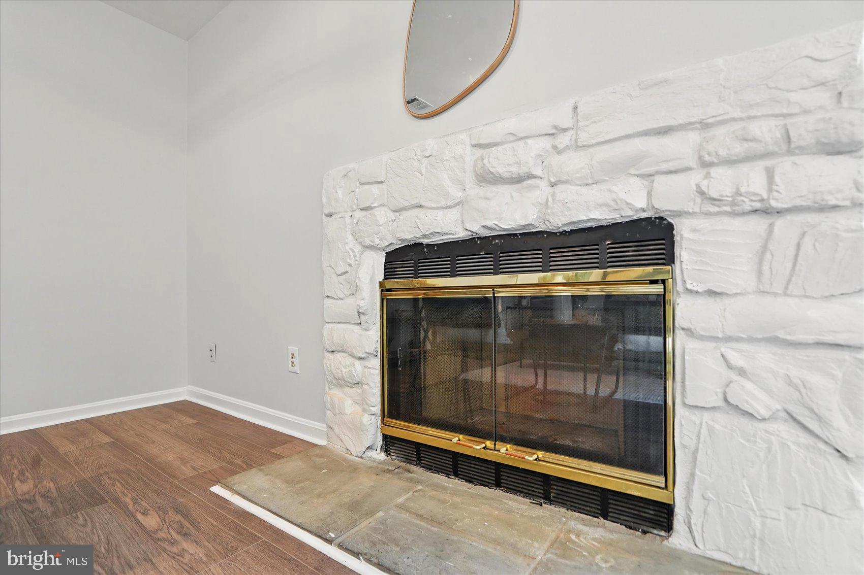 7020 Storch Lane Lanham, MD 20706 - Photo 6 of 44 a room with fireplace