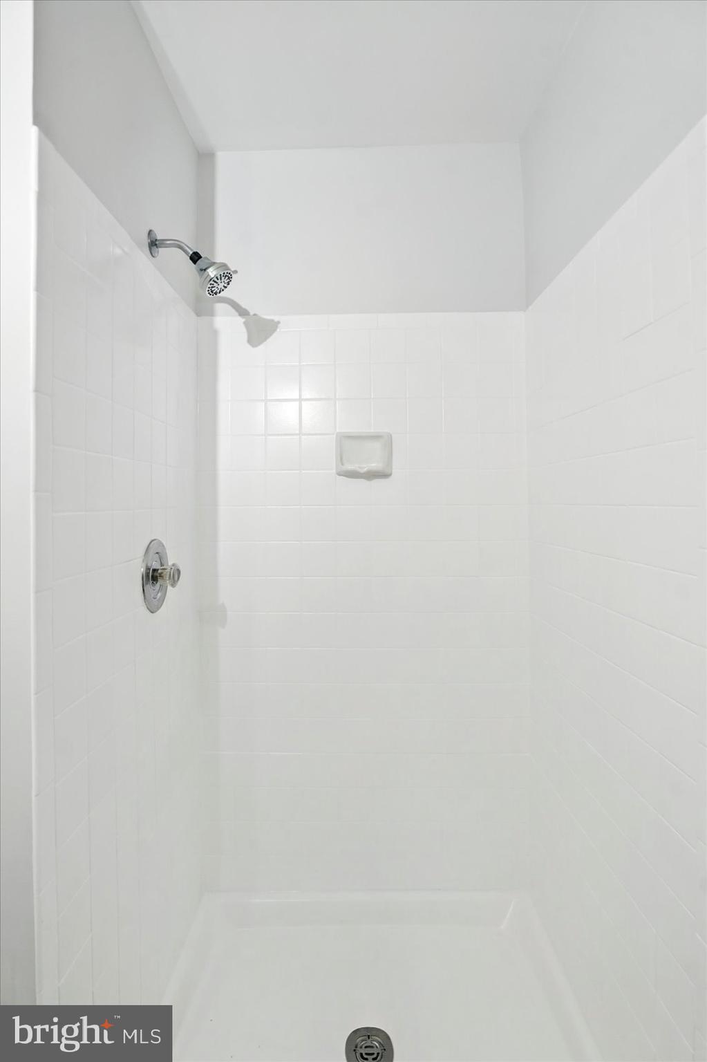 7020 Storch Lane Lanham, MD 20706 - Photo 8 of 44 a bathroom with a shower