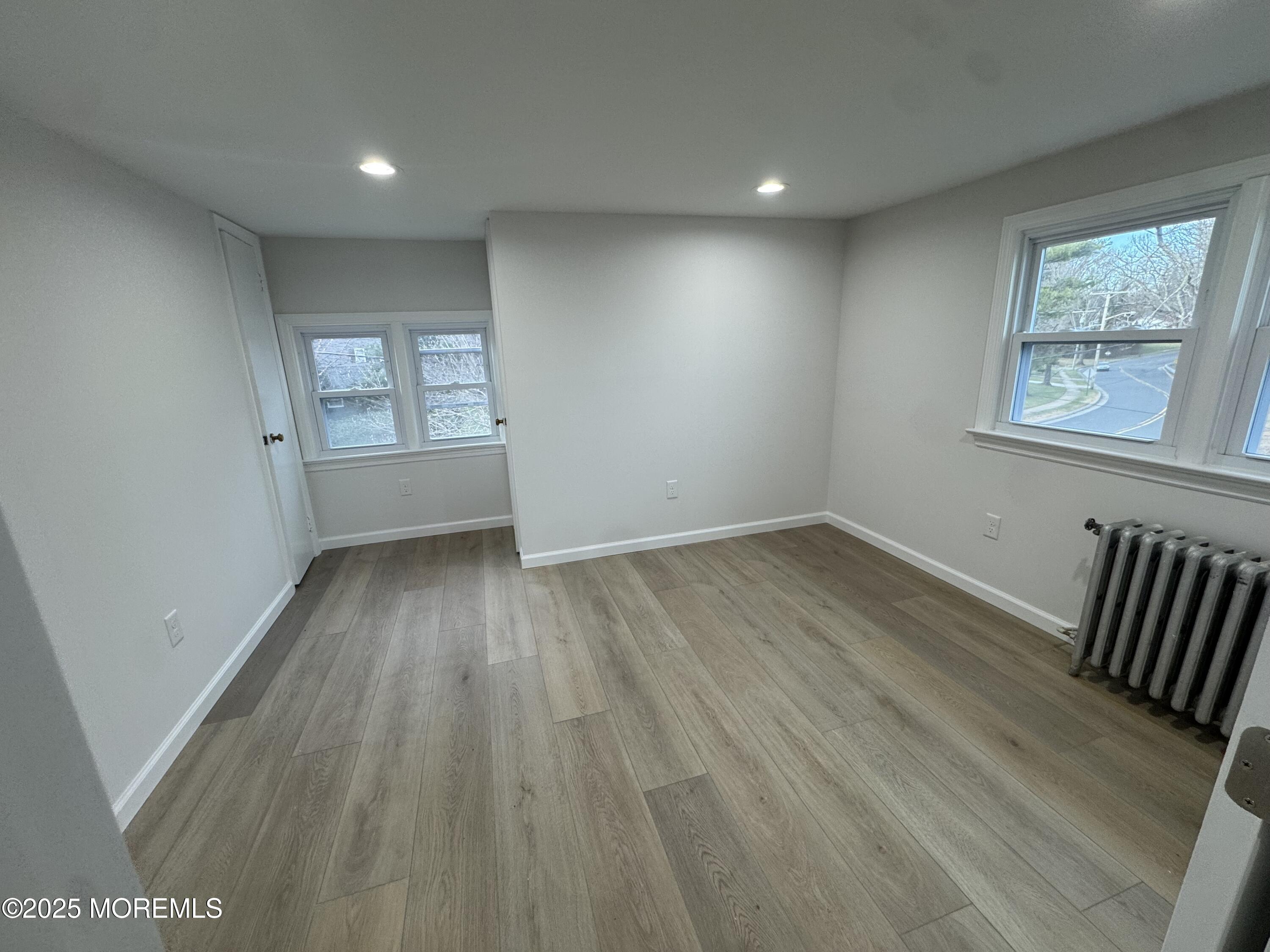 259 Matawan Avenue Matawan, NJ 07747 - Photo 12 of 46 wooden floor in an empty room with a window