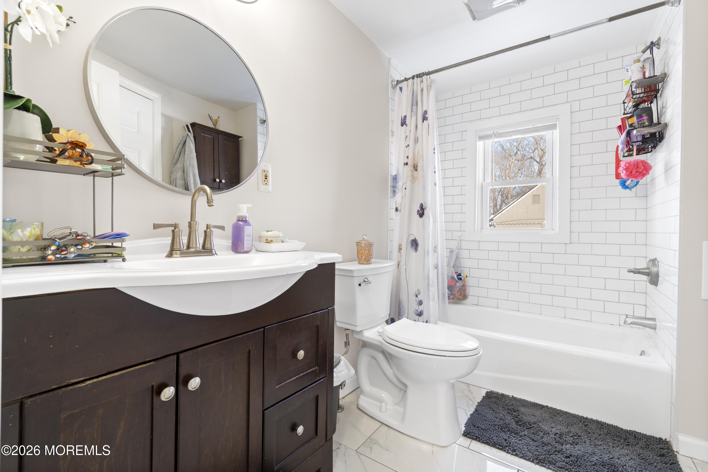 259 Matawan Avenue Matawan, NJ 07747 - Photo 31 of 46 a bathroom with a sink and a mirror
