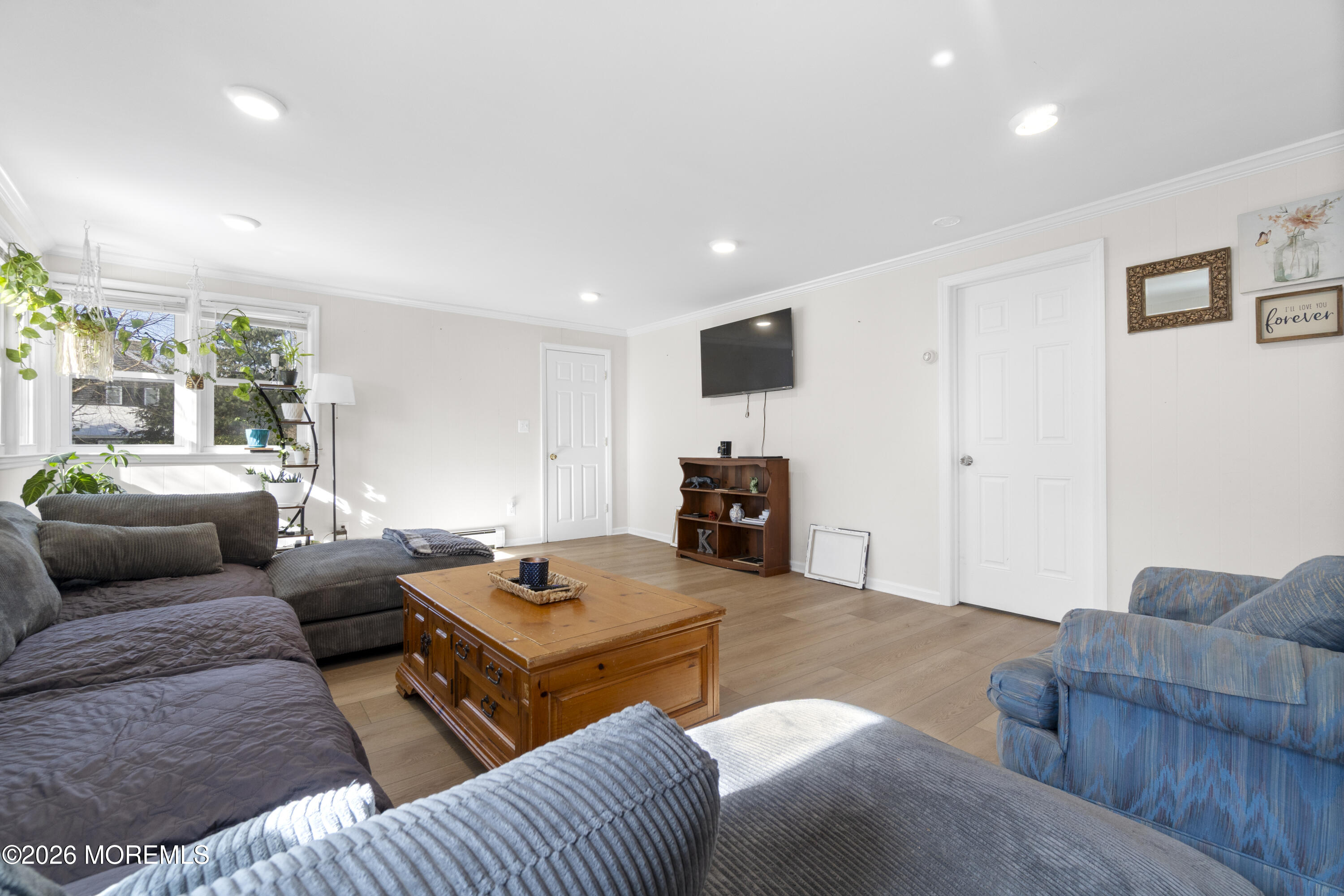 259 Matawan Avenue Matawan, NJ 07747 - Photo 33 of 46 a living room with furniture and a couch