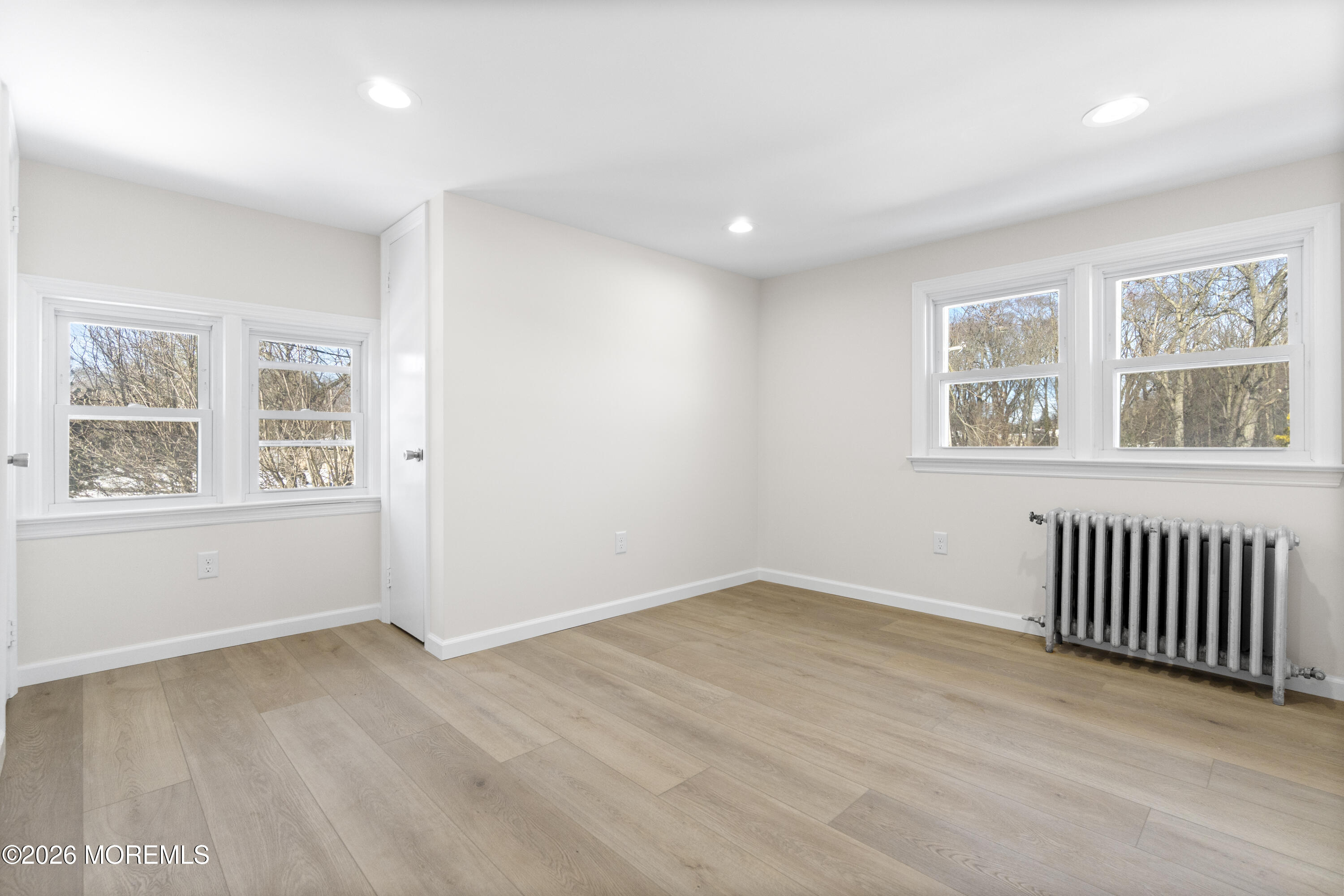 259 Matawan Avenue Matawan, NJ 07747 - Photo 9 of 46 a view of an empty room with a window