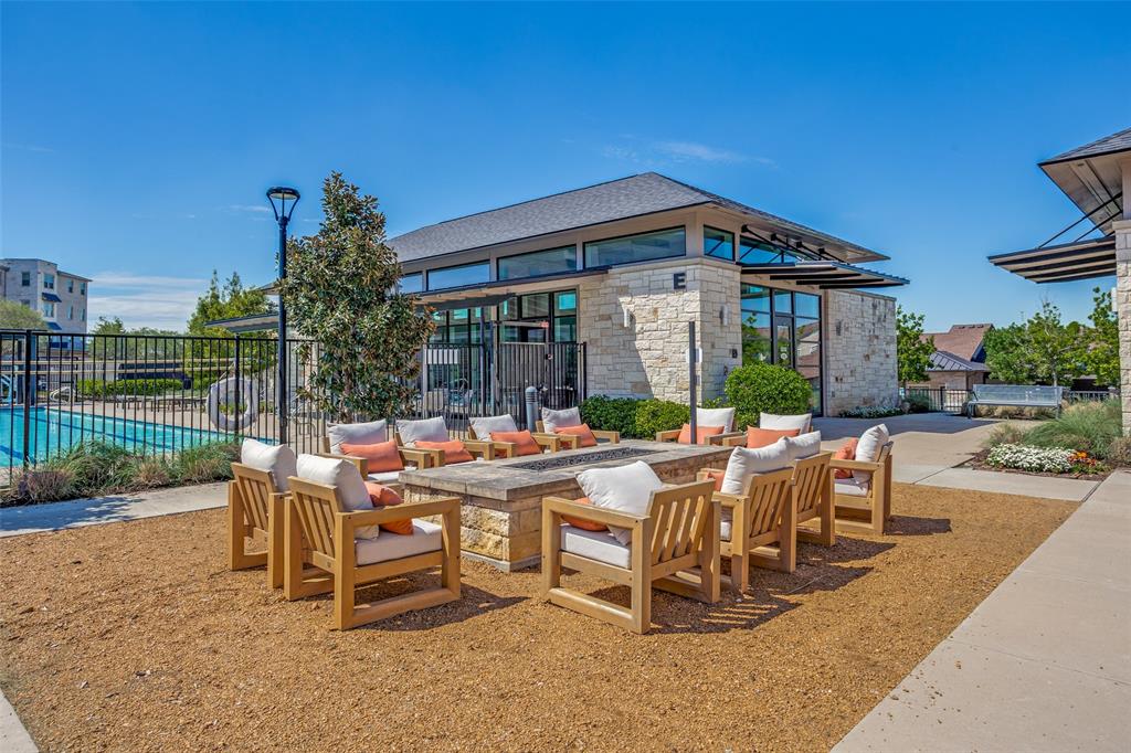 651 Watters Road, Unit 1206 Allen, TX 75013 - Photo 25 of 29 a view of a patio with a table and chairs