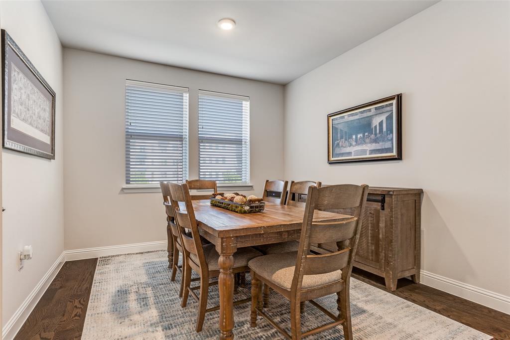 651 Watters Road, Unit 1206 Allen, TX 75013 - Photo 10 of 29 a view of a dining room with furniture and window