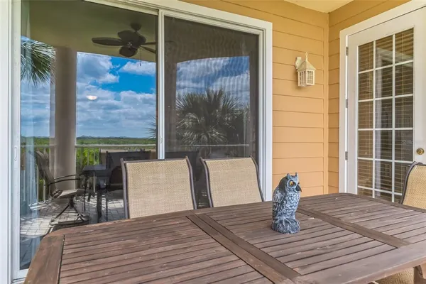 a view of a swimming pool with a lounge chair