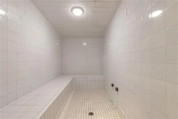 a view of a living room kitchen and a couch