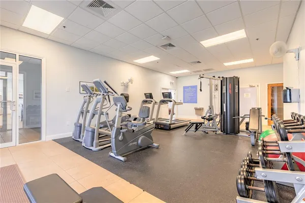 a view of a dining room with furniture and window