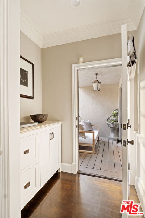 8455 Fountain Avenue, Unit 411 West Hollywood, CA 90069 - Photo 22 of 27 a en suite bathroom with a granite countertop sink and a mirror
