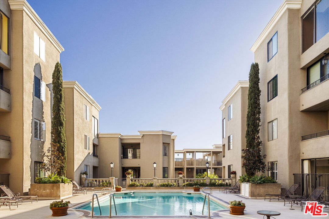 8455 Fountain Avenue, Unit 411 West Hollywood, CA 90069 - Photo 26 of 27 a view of a city with tall buildings