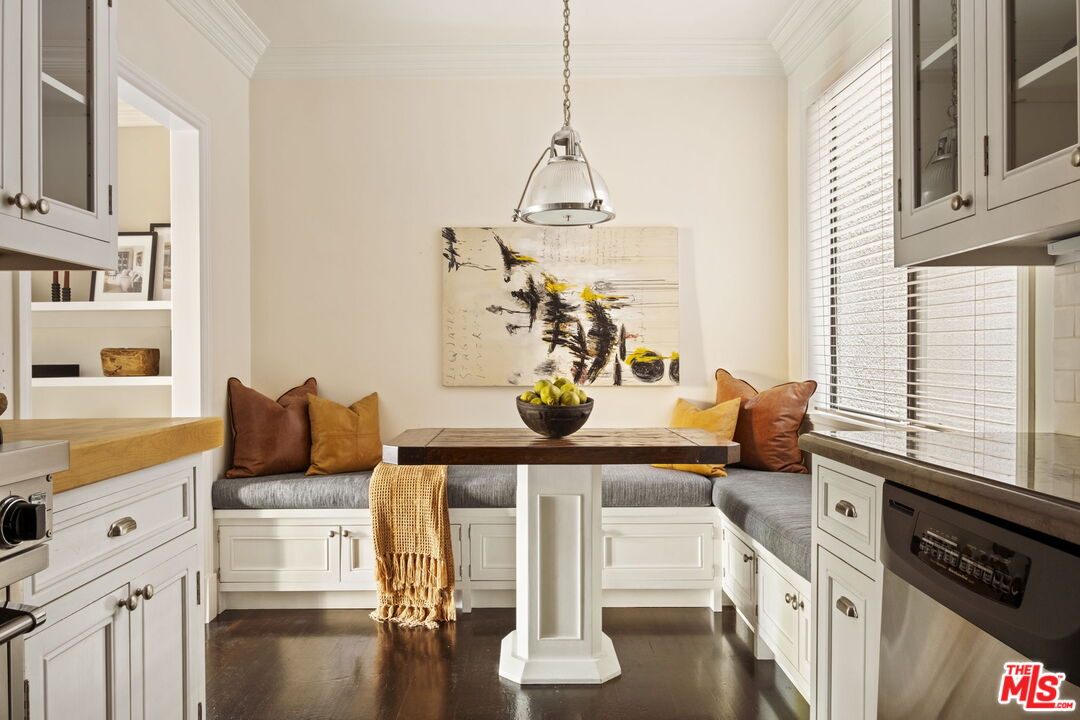 8455 Fountain Avenue, Unit 411 West Hollywood, CA 90069 - Photo 10 of 27 a living room with furniture and floor to ceiling windows