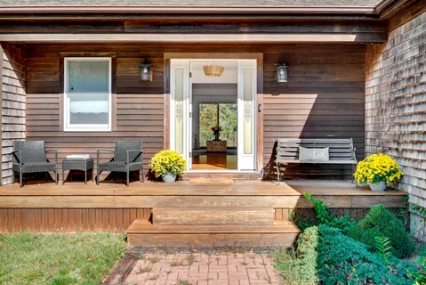 a view of house with outdoor space and seating space