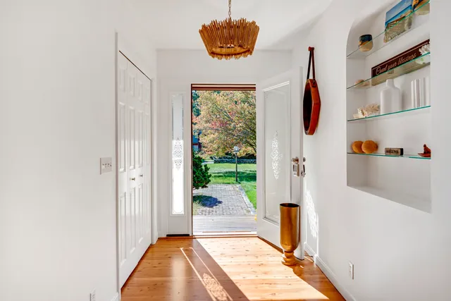 a view of entryway with a front door