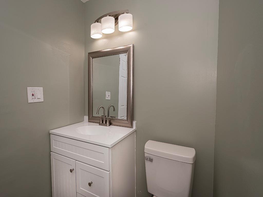 1535 Powers Run Road Pittsburgh, PA 15238 - Photo 14 of 22 a bathroom with a toilet sink and vanity