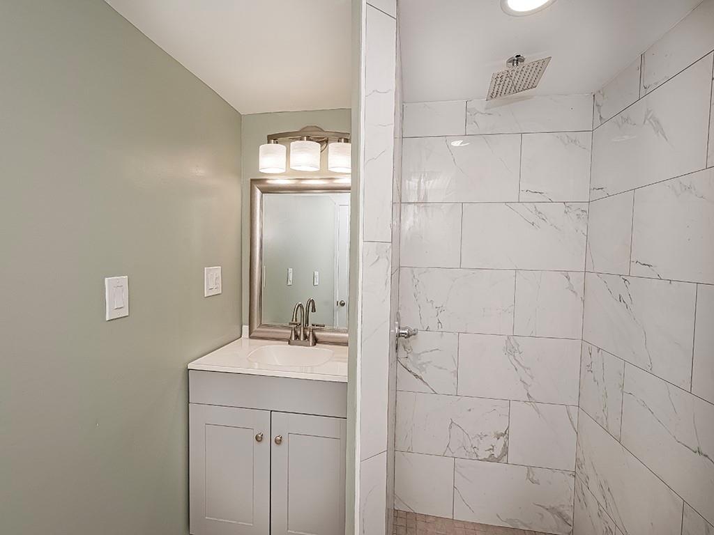1535 Powers Run Road Pittsburgh, PA 15238 - Photo 9 of 22 a bathroom with a sink and a mirror