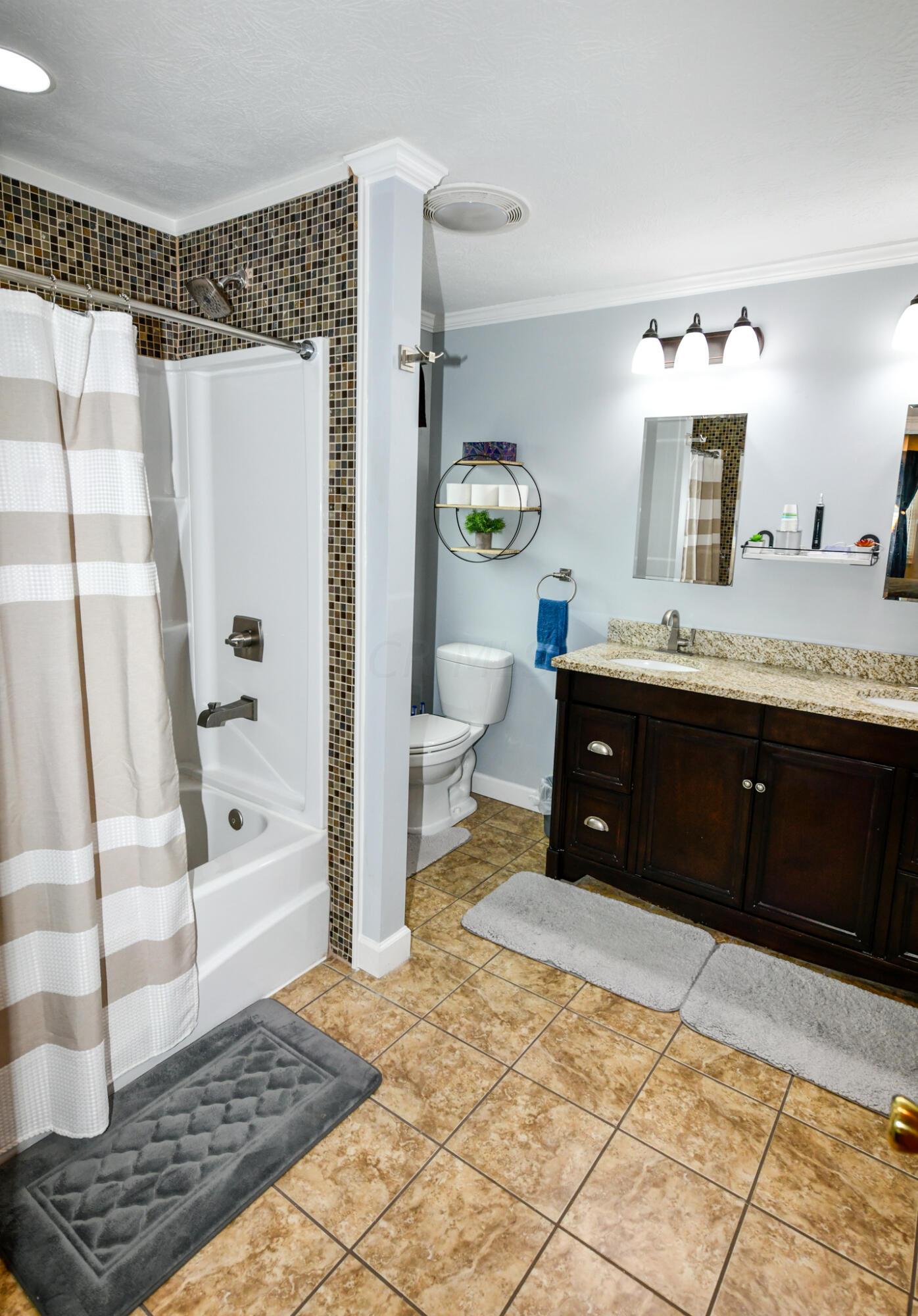 5694 Benzler Road Prospect, OH 43342 - Photo 19 of 42 All Tiled Flooring and Tub/Shower Surround