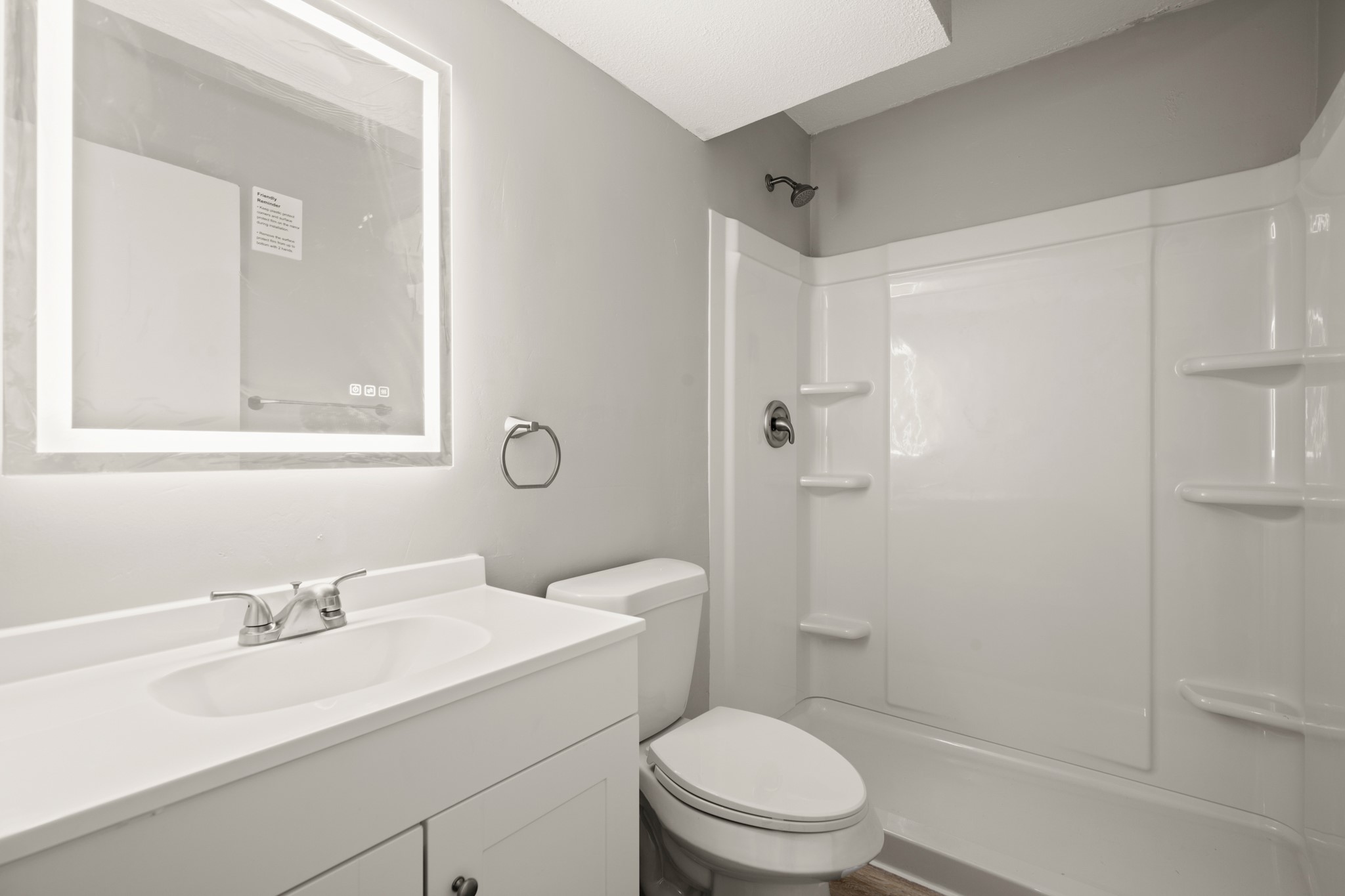 910 Duncan Lane, Unit 56 Austin, TX 78705 - Photo 8 of 17 a bathroom with a sink toilet vanity and shower