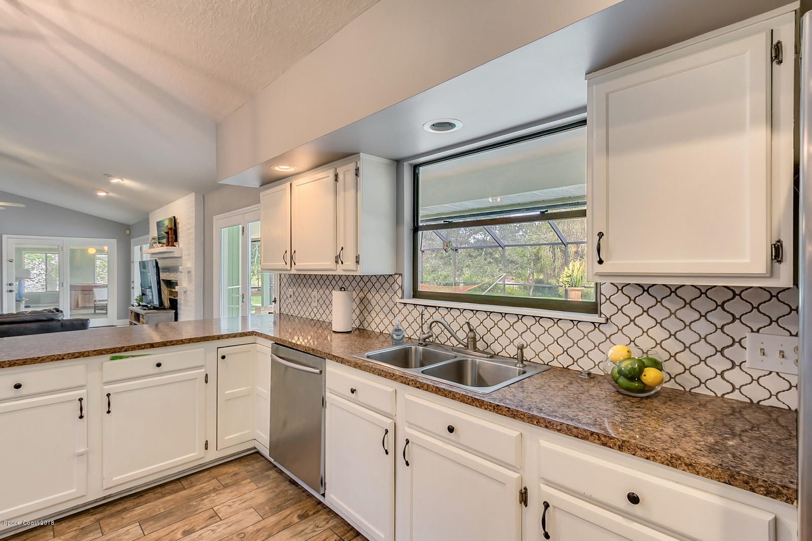 4300 Country Road Melbourne, FL 32934 - Photo 11 of 46 Kitchen Window Overlooking Pool